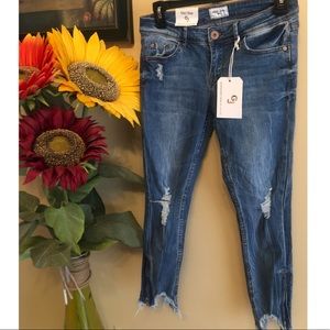 Mid rise distressed jeans